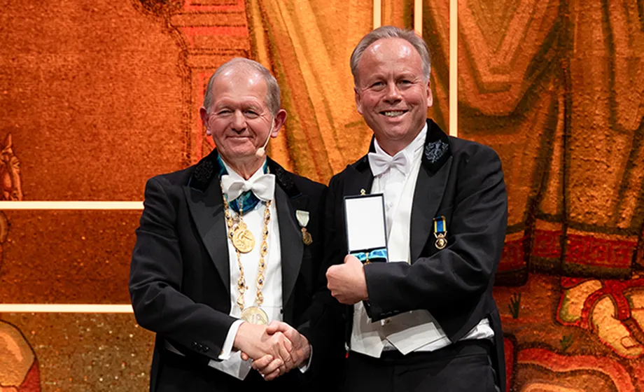 Two men in tailcoats.
