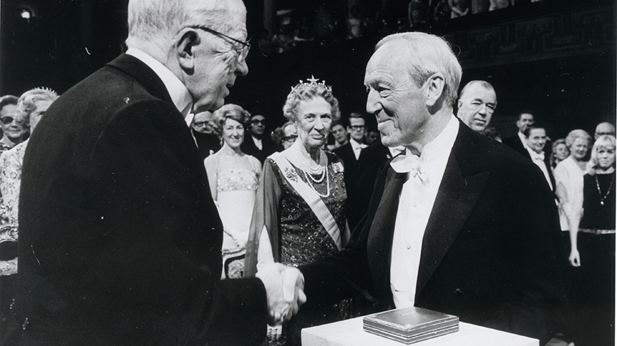 King Gustaf VI Adolf of Sweden presents the Nobel Prize in Physics to Hannes Alfvén in 1970. 
