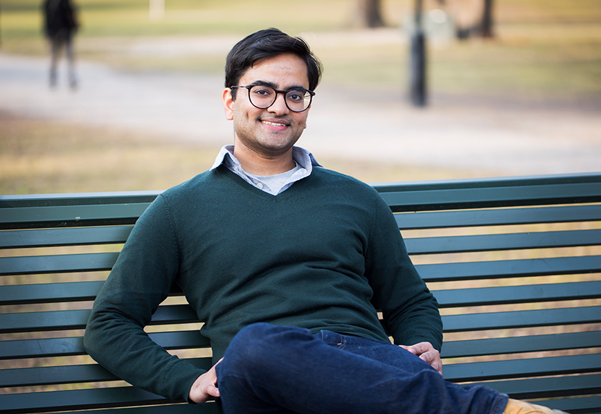 Umar Chughtai sitting on park bench