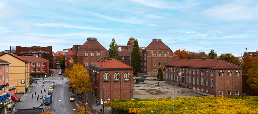 KTH Campus with its red brick buildings in the autumn.