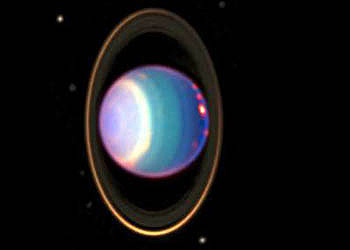 Uranus' and its rings in an image by the Hubble Space Telescope