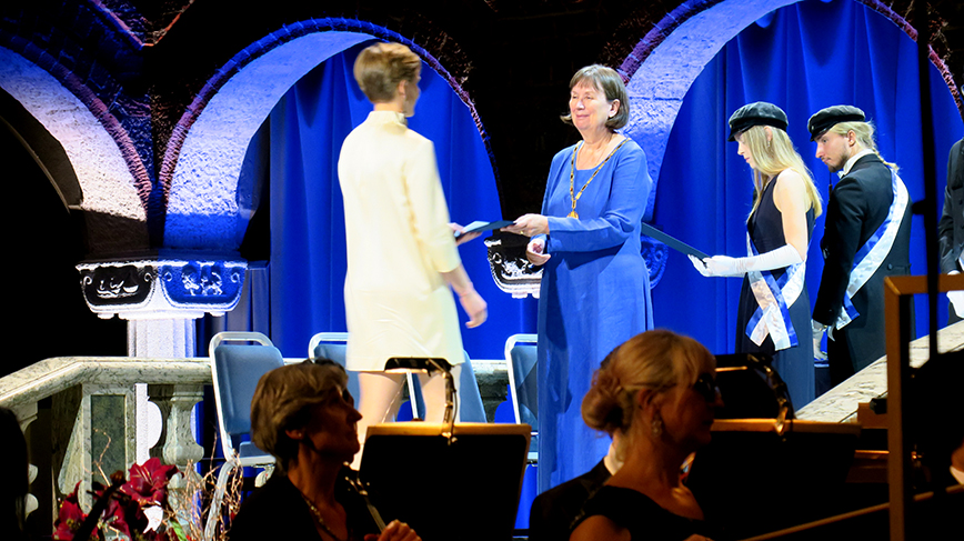 Graduates at Stockholm City Hall  receive their diplomas