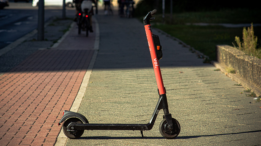 A parked electric scooter from Voi.