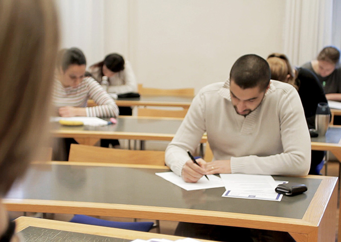 Students writing an examination.