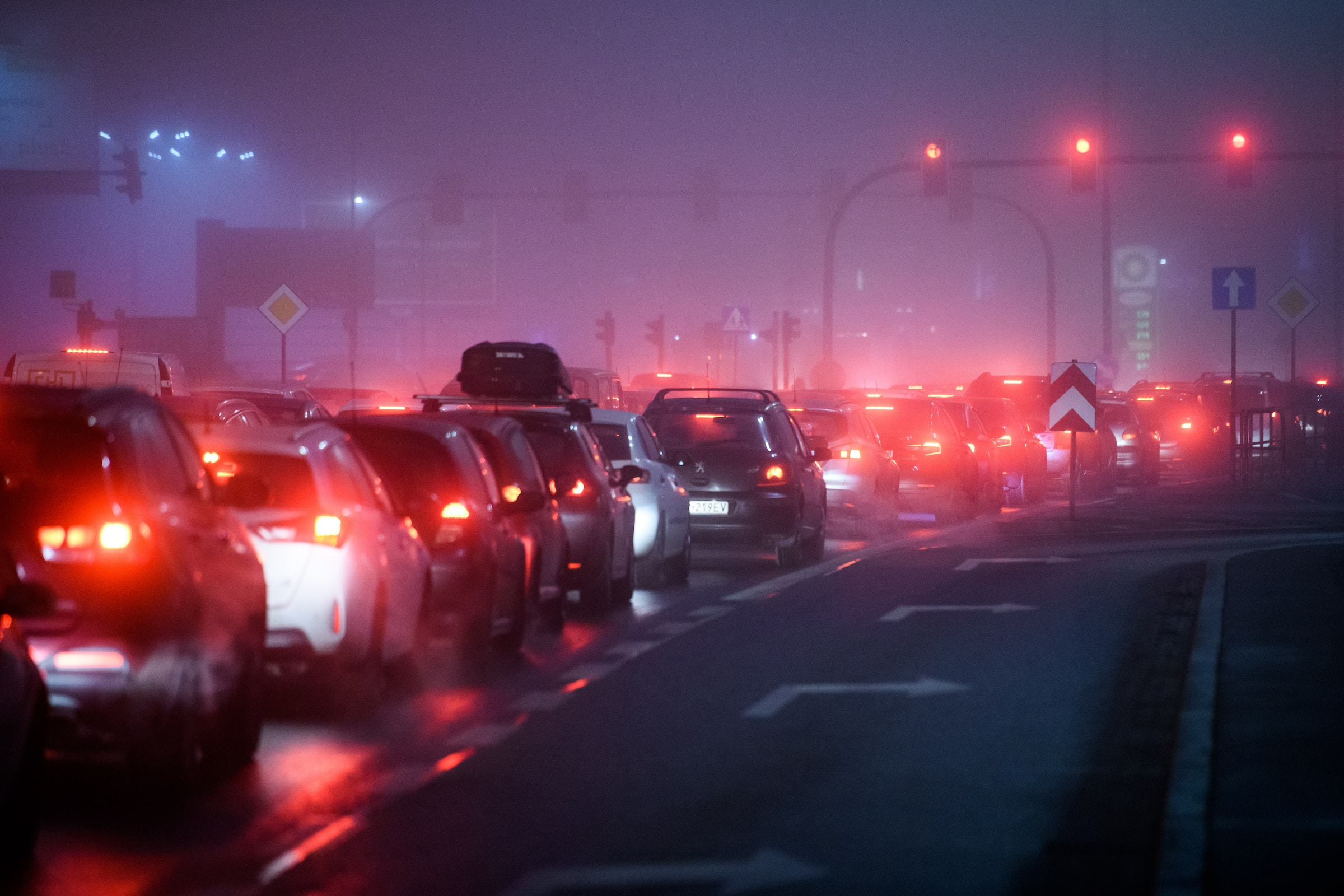 Smog and heavy traffic at night.