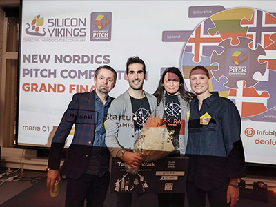 Akira Science accepting a prize check 