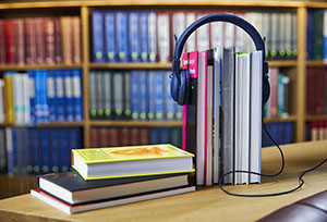 headphones on book