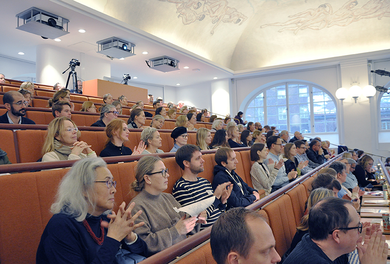 A group of people in an auditorium