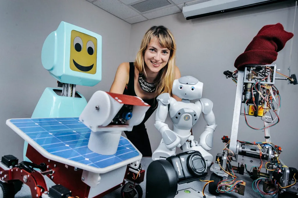 Dr. Heather Knight together with some social robots