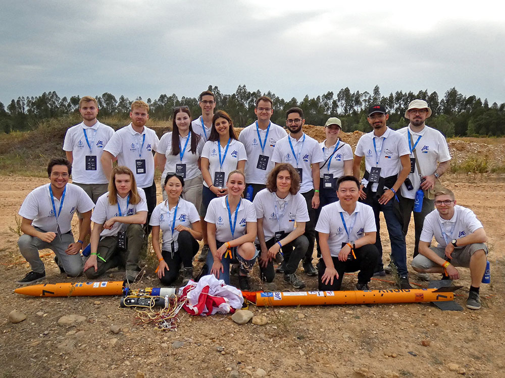 group picture, KTH students with rocket