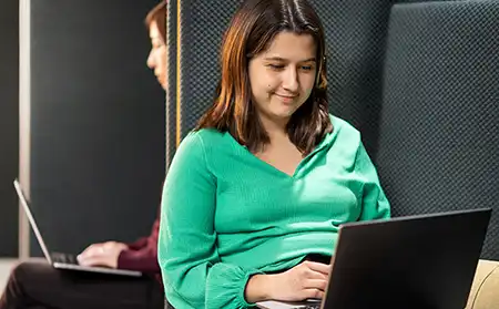 A student with a laptop