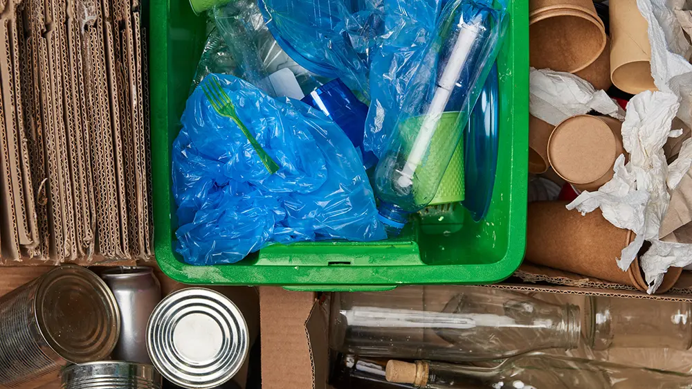 Plastics, metal, cardboard ready for recycling.