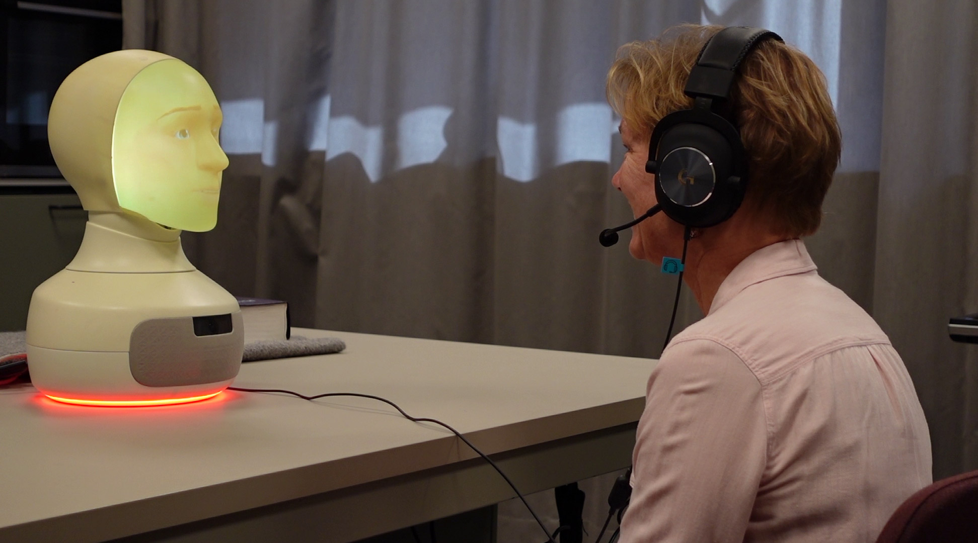 a robot and a person talking