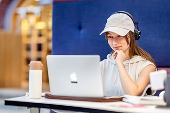 Student working on a computer. 