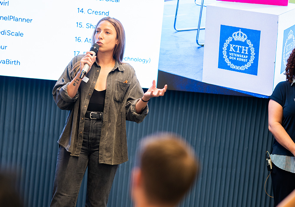 A woman holding a presentation