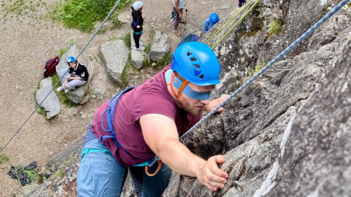 Man climbing a rock