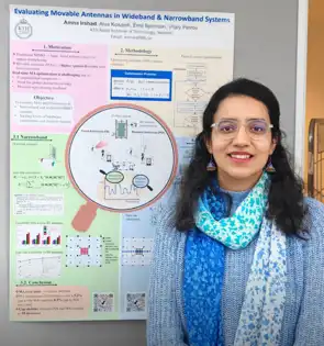 Portrait photo of woman in front of scientific poster.