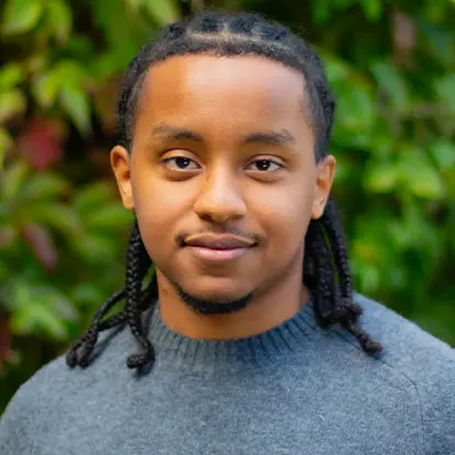 Porträttfoto av studenten Amanuel