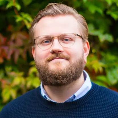 Porträttfoto av studenten Benjamin