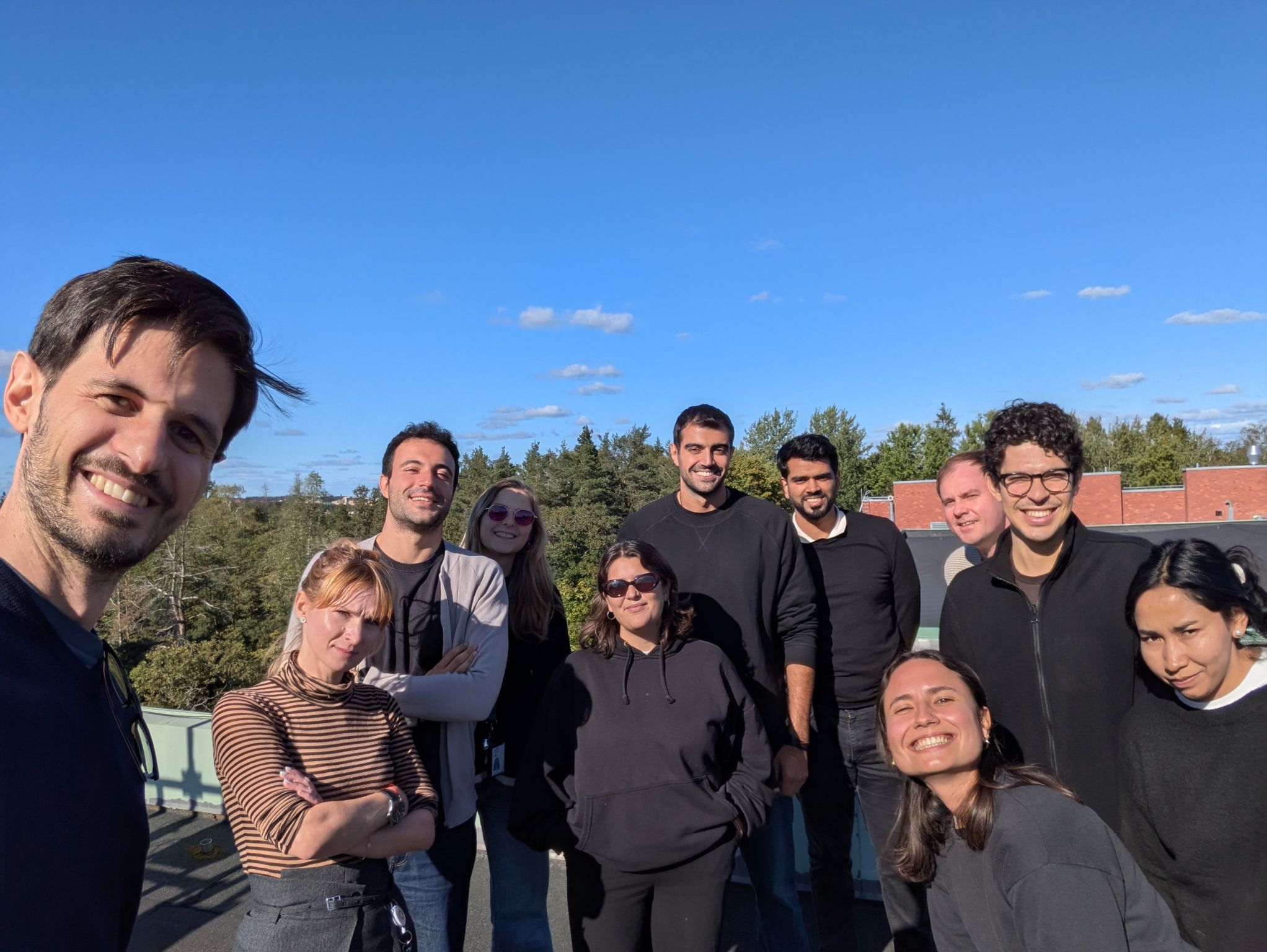 Soroush Zarghami and some of his colleagues in dES, on the rooftop of the M building.