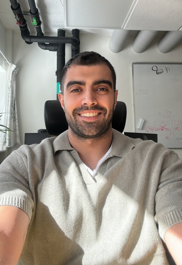 Photo of Soroush Zarghami in his office in dES.