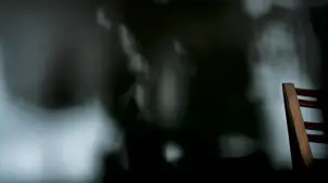 Black and white visuals with a chair in the foreground