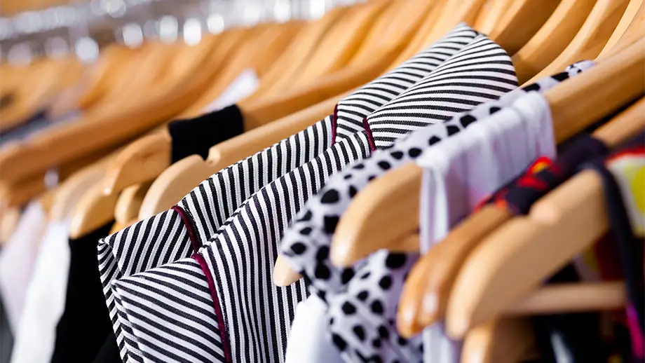 Clothing on rack in shop