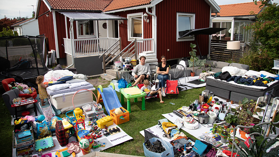 Family in their garden full of plastic things