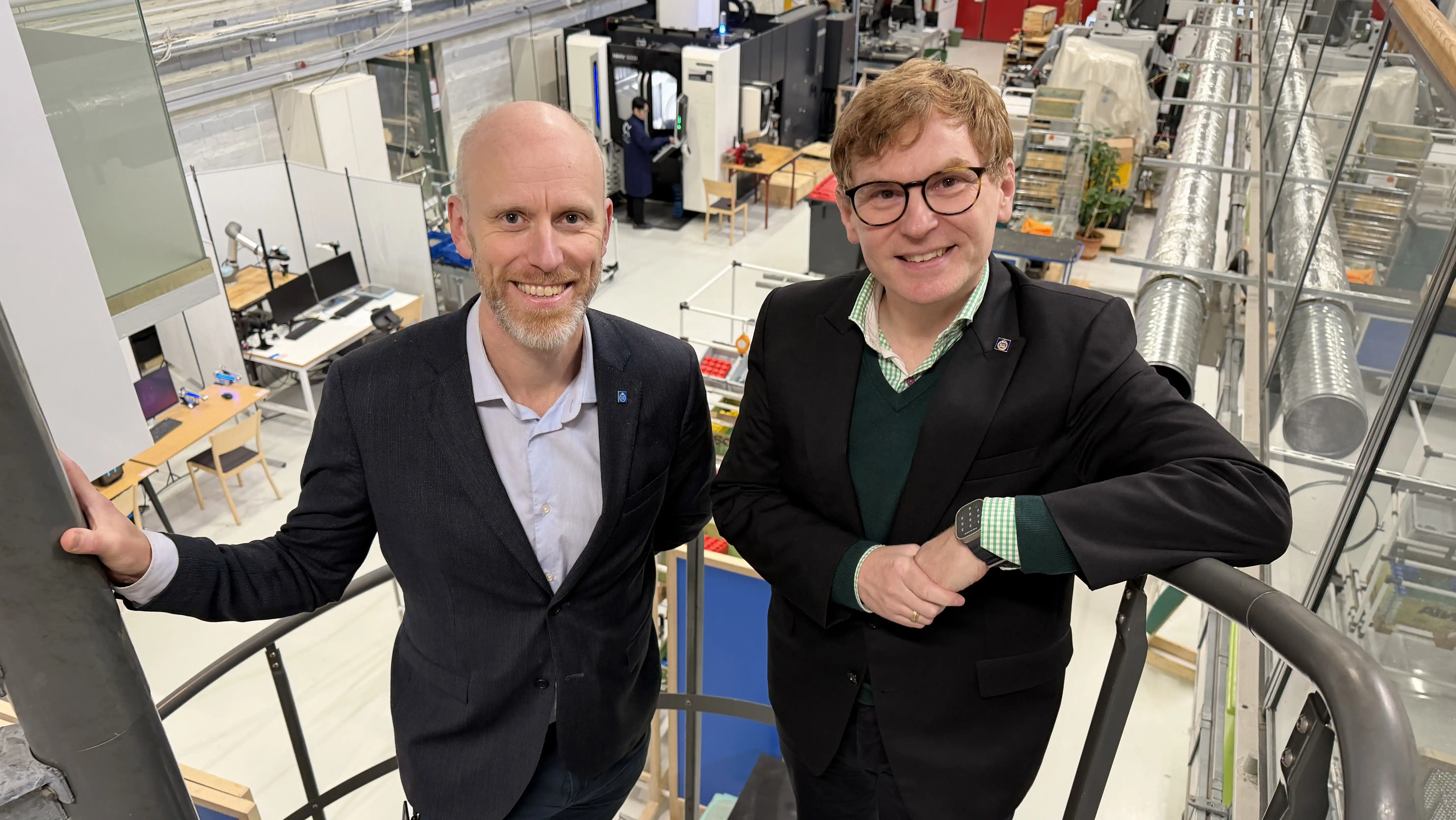 Two men in a production lab