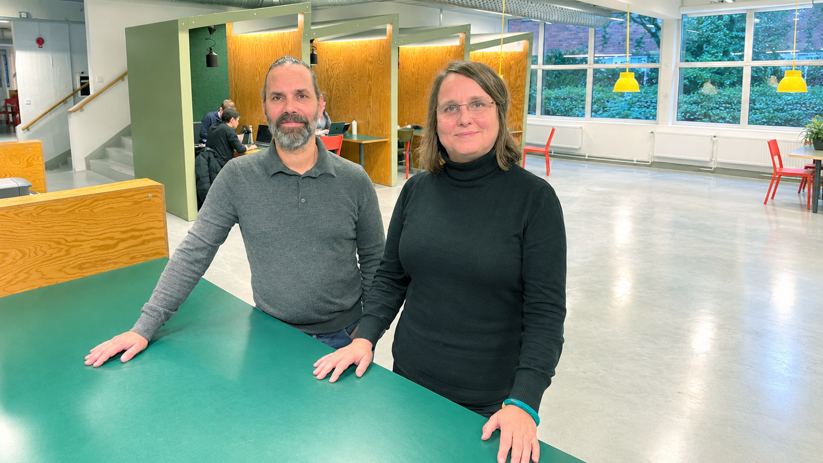 Man and woman in study environment