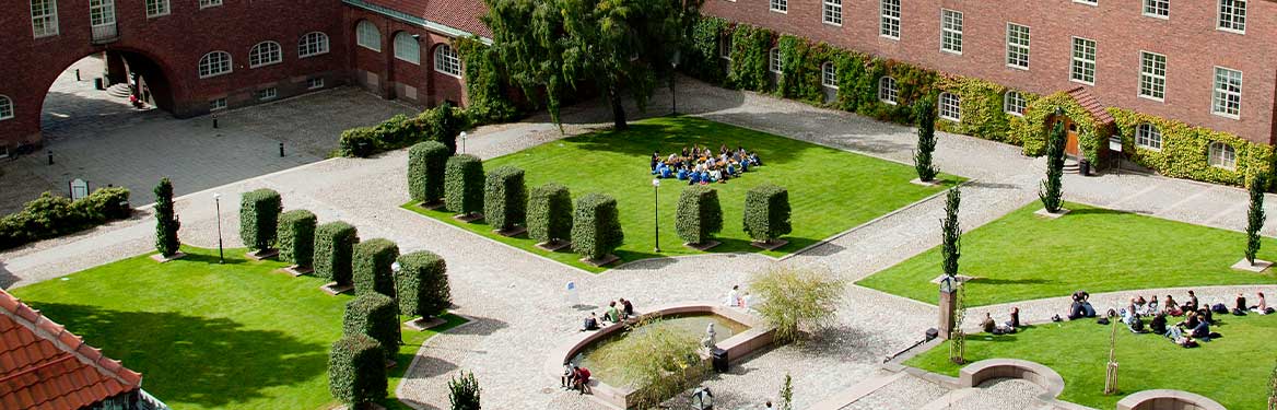 KTH's main courtyard building bustling with students 