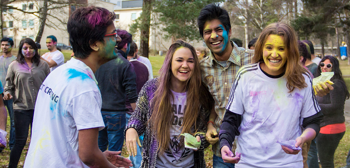 Students celebrating Holi, the Indian festival of colours, on campus