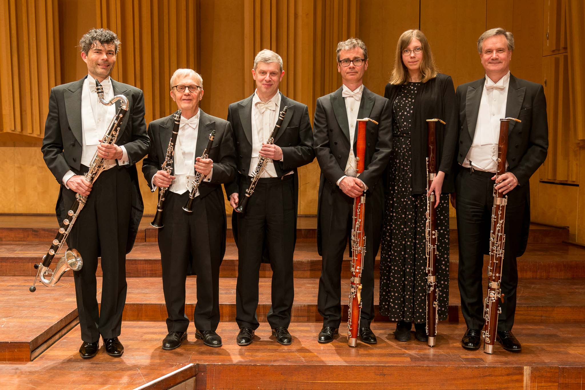 Kjetil Falkenberg Hansen, Claes Dahlqvist and Stefan Nilsson holding clarinets. Amanda Kann, Adam Nyqvist and Gunnar Hellquist are holding bassoons.